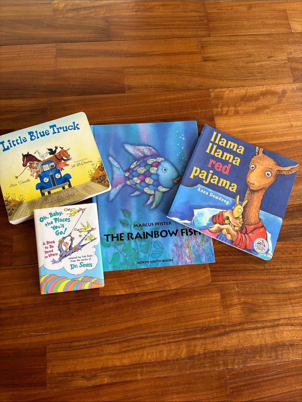 Set of four children’s books (3 hardcover and 1 paperback)